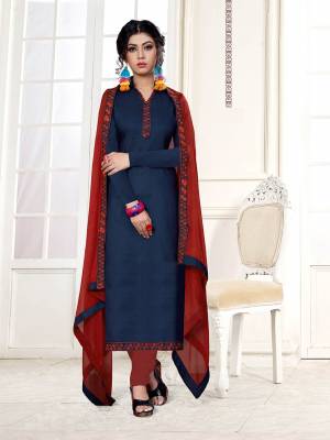 Lovely Color Pallete Is Here With This Dress Material In Navy Blue Color Paired With Contrasting Red Colored Bottom And Dupatta. This Dress Material Is Cotton Bottom Paired With Chiffon Fabricated Dupatta, Get This Stitched As Per Your Desired Fit And Comfort. 