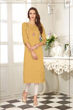 Look Pretty In This Readymade Straight Kurti In Musturd Yellow Color. It Is Fabricated On Soft Satin Silk Beautified With Thread Work. 