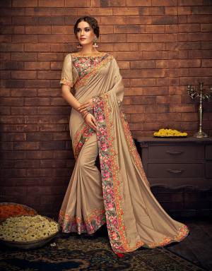 A tasteful combination of delicate florals and bold colors, this saree ticks all the right boxes of feminine , stylish and ethnic tastes. Pair with gold jewelry to finish the look. 