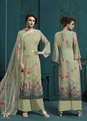 This Season Is About Subtle Shades And Pastel Play, So Grab This Very Pretty Designer Straight Suit In Pastel Green Color. Its Top And Dupatta Are Fabricated On Georgette beautified With Digital Pints And Resham Work Paired With Santoon Fabricated Bottom. 