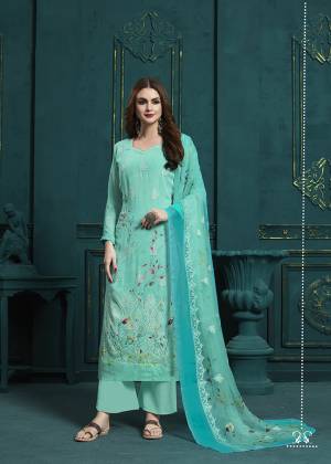 Add This Very Pretty Designer Straight Suit In All Over Turquoise Blue Color. Its Top And Dupatta are Georgette Based Beautified With Digital Prints And Resham Work Paired With Santoon Fabricated Bottom. Buy This Semi-Stitched Now.