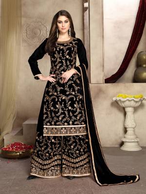 Grab This Attractive Looking Heavy Embroidered Plazzo Suit In Black Color. Its Embroidered Top Is Fabricated On Soft Silk Paired With Georgette Bottom And Net Fabricated Dupatta. Its Top And Bottom Are Beautified With Heavy Jari Embroidery And Stone Work. 