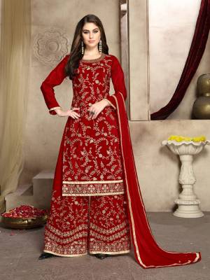 Grab This Attractive Looking Heavy Embroidered Plazzo Suit In Red Color. Its Embroidered Top Is Fabricated On Soft Silk Paired With Georgette Bottom And Net Fabricated Dupatta. Its Top And Bottom Are Beautified With Heavy Jari Embroidery And Stone Work. 