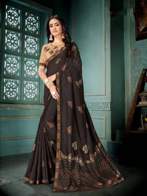 Grab This Saree For Your Semi-Casuals In Brown Color Paired With Beige Colored Blouse. This Saree And Blouse are Silk Based Beautified With Prints And Thread Embroidery. It Is Light In Weight And Easy To Carry All Day Long. 