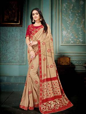 Grab This Saree For Your Semi-Casuals In Beige Color Paired With Red Colored Blouse. This Saree And Blouse are Silk Based Beautified With Prints And Thread Embroidery. It Is Light In Weight And Easy To Carry All Day Long. 