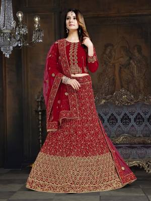Get Ready For The Upcoming Wedding Season With This Very Beautiful Heavy Designer Lehenga Choli In All Over Red Color. Its Blouse And Lehenga Are Fabricated On Velvet Paired With Net Fabricated Dupatta. Buy Now.