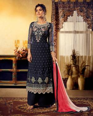 Enhance Your Personality Wearing This Heavy Designer Straight Suit In Navy Blue Colored Top And Bottom Paired With Contrasting Dark Pink Colored Dupatta. Its Top Is Beautified With Heavy Jari And Thread Work.
