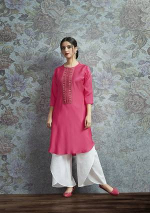 Celebrate This Festive Season With A New Indo-Western Look Wearing This Pair Of Kurti In Rani Pink Color Paired With White Colored Bottom. Its Top Is Fabricated On Modal Satin Beautified With Embroidered Lace Border Paired With Crepe Fabricated Unstitched Bottom. Buy This Lovely Pair Now.