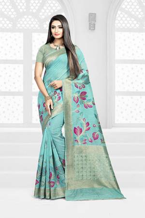 Look Pretty In This Designer Silk Based Tuquoise Blue Colored Floral Saree Paired With Turquoise Blue Colored Blouse. This Saree Is Fabricated On Weaving Silk Paired With Art Silk Fabricated Blouse. Buy This Saree Now.
