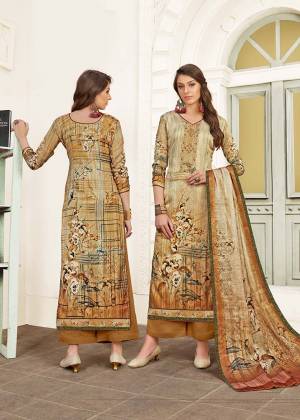 Flaunt Your Rich And Elegant Taste In This Designer Straight Suit In Beige Color. Its Top Is Fabricated On Modal Satin Paired With Satin Bottom And Chiffon Fabricated Dupatta. It Is Beautified With Digital Prints And Thread Work. 