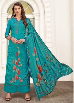 Add This Simple Straight Suit For Semi-Casuals In Blue Color. Its Printed Top Is Modal Satin Based Paired With Satin Bottom And Chiffon Fabricated Dupatta. 