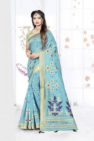 Here Is A Very Pretty Silk Based Saree In Sky Blue Color. This Saree Is Fabricated On Weaving Silk Paired With Art Silk Fabricated Blouse. It Is Light In Weight And Easy To Carry All Day Long. 