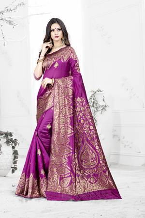 Enhance Your Personality Wearing This Rich Silk Based Designer Saree In Light Purple Color Paired With Navy Blue Colored Blouse. This Saree Is Beautified With Bold Weave Giving It An Enhanced Look.