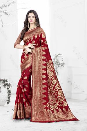 Enhance Your Personality Wearing This Rich Silk Based Designer Saree In Red Color Paired With Navy Blue Colored Blouse. This Saree Is Beautified With Bold Weave Giving It An Enhanced Look.