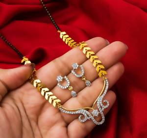Grab This Very Pretty Mangalsutra Set With A Whole New Design And Pattern. This Pretty Set Can Be Paired With Any Colored Ethnic Attire. It Is Light Weight And Easy To Carry All Day Long.