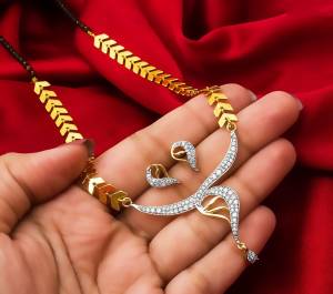 Grab This Very Pretty Mangalsutra Set With A Whole New Design And Pattern. This Pretty Set Can Be Paired With Any Colored Ethnic Attire. It Is Light Weight And Easy To Carry All Day Long.
