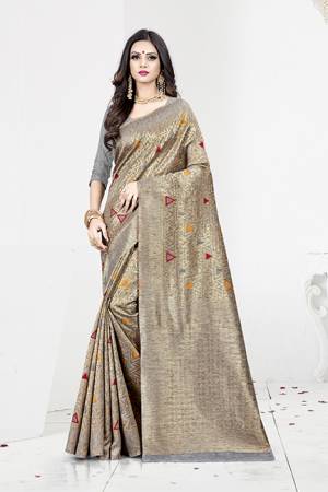 Shine Bright In This Designer Silk Based Saree In Grey Color Paired With Grey Colored Blouse. This Saree Is Fabricated On Weaving Silk Paired With Art Silk Fabricated Blouse. It Has Rich Fabric Beautified With Detailed Weave All Over. Buy Now.