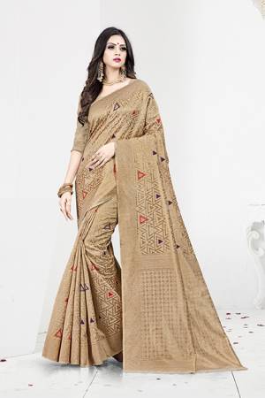 Shine Bright In This Designer Silk Based Saree In Beige Color Paired With Beige Colored Blouse. This Saree Is Fabricated On Weaving Silk Paired With Art Silk Fabricated Blouse. It Has Rich Fabric Beautified With Detailed Weave All Over. Buy Now.