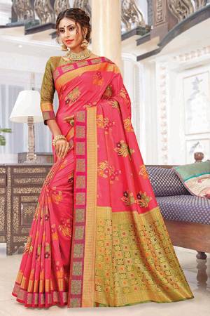 Bright And Appealing Color Is Here With This Silk Based Saree In Dark Pink Color Paired With Contrasting Olive Green Colored Blouse. This Saree Is Weaving Silk Based Paired With Jacquard Silk Fabricated Blouse. Its Fabric Is Durable And Easy To Care For.