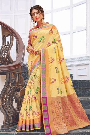 Rich And Elegant Looking Designer Silk Based Saree Is Here In Yellow Color Paired With Pink Colored Blouse. It Is Beautified With Print And Weave. Buy Now.