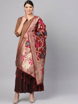 For A Proper Traditional Look, Pair Up Your Simple Attire With This Trendy Banarasi Art Silk Fabricated Dupatta. It Is Beautified With Weave All Over. Also It Is Light In Weight And Easy To Carry All Day Long.