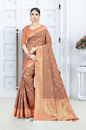 Grab This Pretty Floral Saree In Orange Color Paired With Orange Colored Blouse. This Saree Is Fabricated On Weaving Silk Paired With Art Silk Fabricated Blouse. This Pretty Saree Is Light Weight, Durable And Easy To Care For.