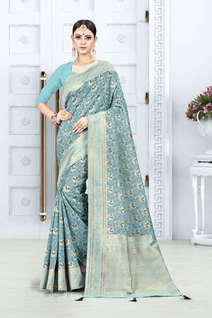Grab This Pretty Floral Saree In Blue Color Paired With Blue Colored Blouse. This Saree Is Fabricated On Weaving Silk Paired With Art Silk Fabricated Blouse. This Pretty Saree Is Light Weight, Durable And Easy To Care For.