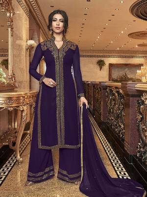Look Beutifully Elegant Wearing This Designer Plazzo Suit In Violet Color. Its Pretty Top , Bottom And Dupatta Are Fabricated On Georgette Beautified With Attractive And Elegant Stone Work. 