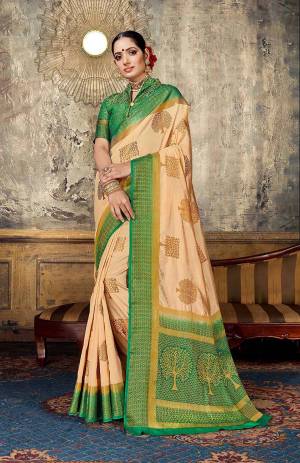 Look Elegant With This Rich Looking Silk Based Saree In Light Peach Color Paired With Contrasting Green Colored Blouse. This Saree Is Fabricated On Art Silk Paired With Jacquard Silk Fabricated Blouse. It Is Beautified With Elegant Weave Giving An Attractive Look. 