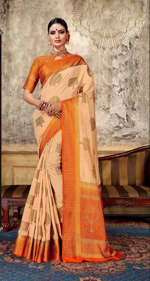 Look Elegant With This Rich Looking Silk Based Saree In Light Peach Color Paired With Contrasting Orange Colored Blouse. This Saree Is Fabricated On Art Silk Paired With Jacquard Silk Fabricated Blouse. It Is Beautified With Elegant Weave Giving An Attractive Look. 