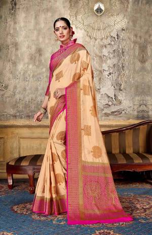 Look Elegant With This Rich Looking Silk Based Saree In Light Peach Color Paired With Contrasting Pink Colored Blouse. This Saree Is Fabricated On Art Silk Paired With Jacquard Silk Fabricated Blouse. It Is Beautified With Elegant Weave Giving An Attractive Look. 