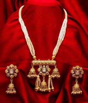 Buy This Heavy Necklace Set For The Upcoming Wedding Season. Pair This Up With Your Heavy Ethnic Attire And As It Is In Golden Color, It Can Be Paired With Any Colored Attire. Buy Now?