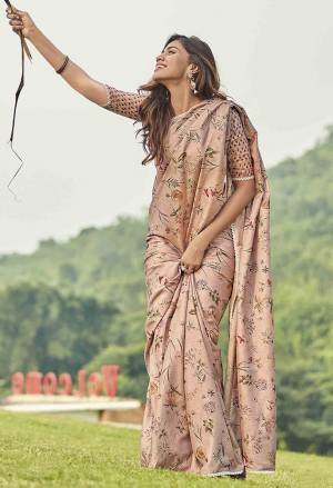 This Festive Season, Look The Most Elegant Of All In This Designer Saree In Dusty Pink Color paired With Dusty Pink Colored Blouse. This Saree And Blouse Are Silk Based Beautified With Lovely Floral Prints And Lace Border. Buy Now.