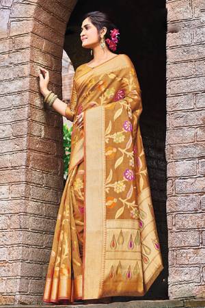 Add This Beautiful Designer Silk Based Saree To Your Wardrobe In Occur Yellow Color For This Festive And Wedding Season. This Rich Silk Based Saree Will Definitely Earn You Lots Of Compliments Which Is Trending This Season. 