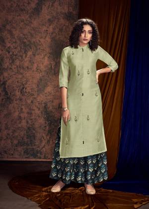 You Will Definitely Earn Lots Of Compliments Wearing This Designer Readymade Pair Of Kurti And Plazzo In Pastel Green And Navy Blue Color Respectively. Its Embroidered Kurti And Printed Plazzo Are Fabricated On Satin Cotton And Available All Regular Sizes. 
