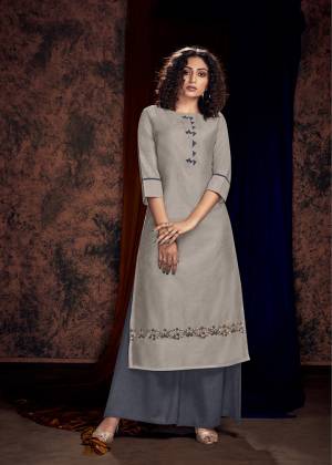 Flaunt Your Rich And Elegant Taste Wearing This Designer Readymade Pair Of Kurti And Plazzo In Shades Of Grey. Its Pretty Hand Embroidered Kurti Is Fabricated On Satin Cotton Paired With Satin Fabricated Bottom. 