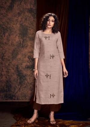 Grab This Designer Pair Of Readymade Kurti And Plazzo In Beige Colored Kurti Paired With Contrasting Brown Colored Plazzo. Its Kurti IS Khadi Silk Based Paired With Rayon Fabricated Bottom. Buy Now.