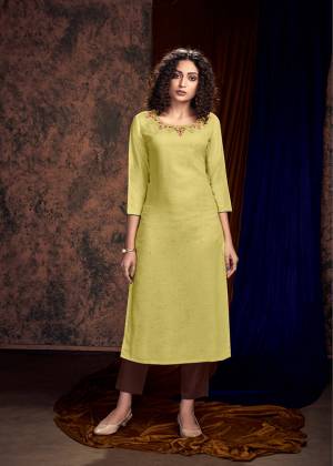 Grab This Designer Pair Of Readymade Kurti And Plazzo In Light Yellow Colored Kurti Paired With Contrasting Brown Colored Plazzo. Its Kurti Is Satin Slub Based Paired With Rayon Fabricated Bottom. Buy Now.