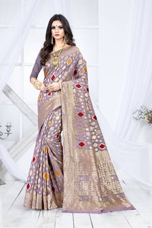 Shine Bright In This Designer Silk Based Saree In Mauve Color Paired With Mauve Colored Blouse. This Saree Is Fabricated On Weaving Silk Paired With Art Silk Fabricated Blouse. It Has Rich Fabric Beautified With Detailed Weave All Over. Buy Now.