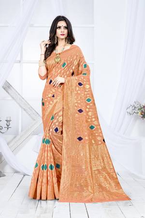 Shine Bright In This Designer Silk Based Saree In Orange Color Paired With Orange Colored Blouse. This Saree Is Fabricated On Weaving Silk Paired With Art Silk Fabricated Blouse. It Has Rich Fabric Beautified With Detailed Weave All Over. Buy Now.