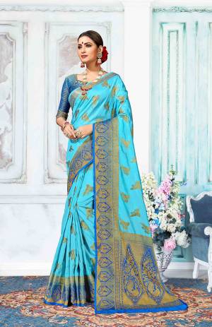 Go With The Shades Of Blue With This Blue Colored Saree Paired With Royal Blue Colored Blouse. This Saree Is Fabricated On Art Silk Paired With Jacquard Silk Fabricated Blouse. It Is Beautified With Weave All Over. Buy Now.