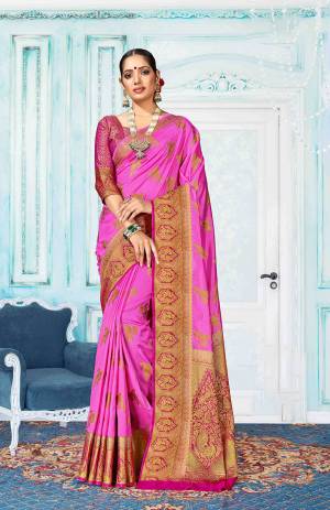 Go With The Shades Of Pink With This Rani Pink Colored Saree Paired With Magenta Pink Colored Blouse. This Saree Is Fabricated On Art Silk Paired With Jacquard Silk Fabricated Blouse. It Is Beautified With Weave All Over. Buy Now.