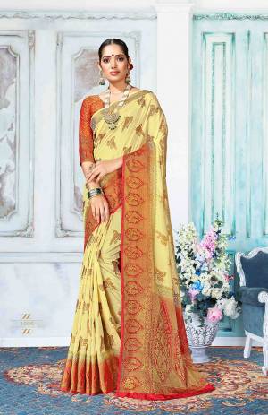 Go With Pretty Shades With This Light Yellow Colored Saree Paired With Red Colored Blouse. This Saree Is Fabricated On Art Silk Paired With Jacquard Silk Fabricated Blouse. It Is Beautified With Weave All Over. Buy Now.