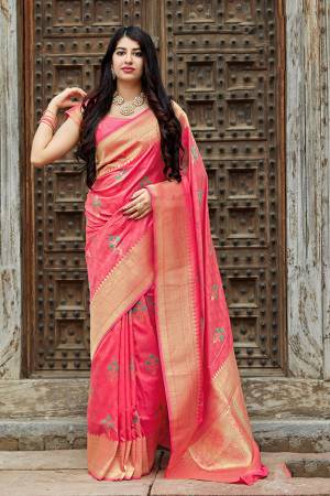 Celebrate This Festive Season In This Lovely Designer Saree Beautified With Floral Weave. This Saree And Blouse Are Silk Based Which Gives A Rich Look To Your Personality. 