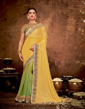 Embrace the ethnic elegance of India in this vibrant yellow and green saree adorned with delicate floral embroidery and look like perfection. 
