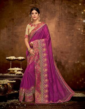 Represent Indian culture in its finest form in this Magenta Pink saree with ornate floral embroidered details. Pair with pretty meenakari jewels to complete the look. 