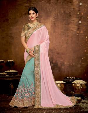 Embrace divinity and emit a beautiful appeal in this halh-and-half saree with pastel floral details. Pair with a maharani choker to give that royal look. 