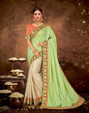 Paint exquisite ethnic wear dreams into reality in this vibrant green and Cream saree and set your look apart from the crowd. 