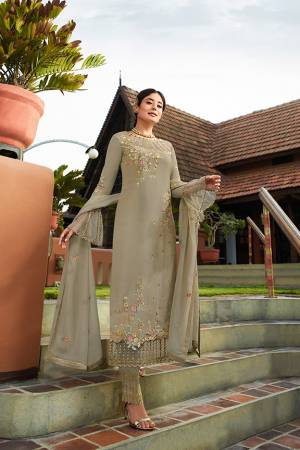 Grab This Very Beautiful Heavy Designer Straight Cut Suit In Pale Grey Color. Its Pretty Embroidered Top And Dupatta Are Fabricated On Georgette Paired With Embroidered Santoon Fabricated Bottom. Buy This Lovely Suit Now.