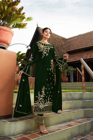 Grab This Very Beautiful Heavy Designer Straight Cut Suit In Dark Green Color. Its Pretty Embroidered Top And Dupatta Are Fabricated On Georgette Paired With Embroidered Santoon Fabricated Bottom. Buy This Lovely Suit Now.